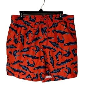 Orange swim trunks with alligators size L